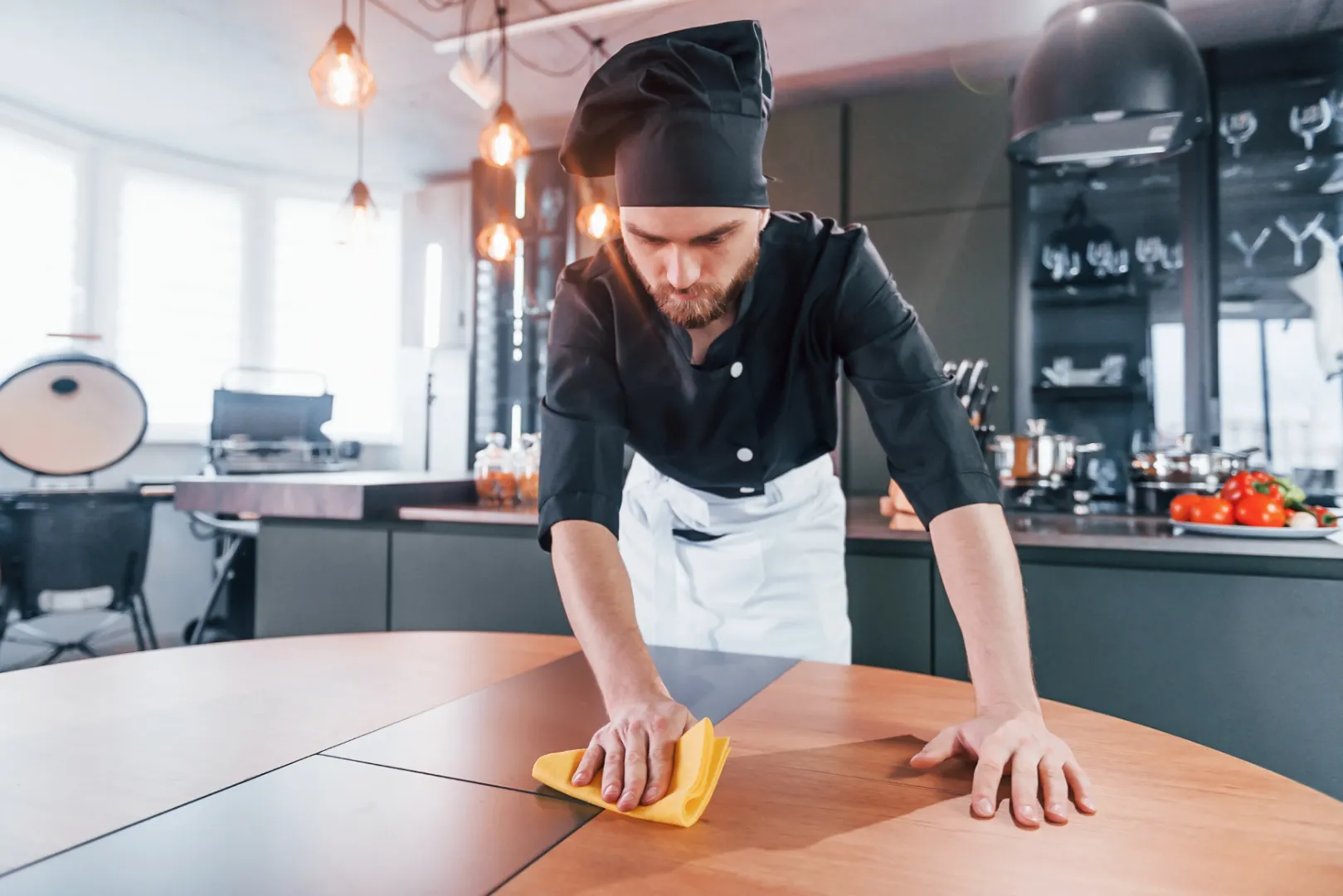 Professional cleaning a commercial kitchen after construction